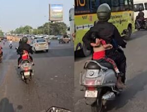 এক হাতে হ্যান্ডেল, অন্য হাতে ঘুমন্ত মেয়েকে মরণপণ জাপটে ধরা! বাবার স্কুটার চালানোর ভিডিও ভাইরাল